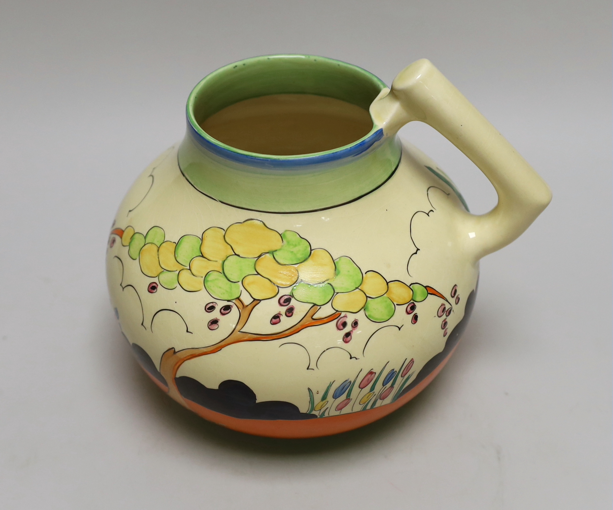 A 1930s Clarice Cliff Tulip pattern jug, 19cm